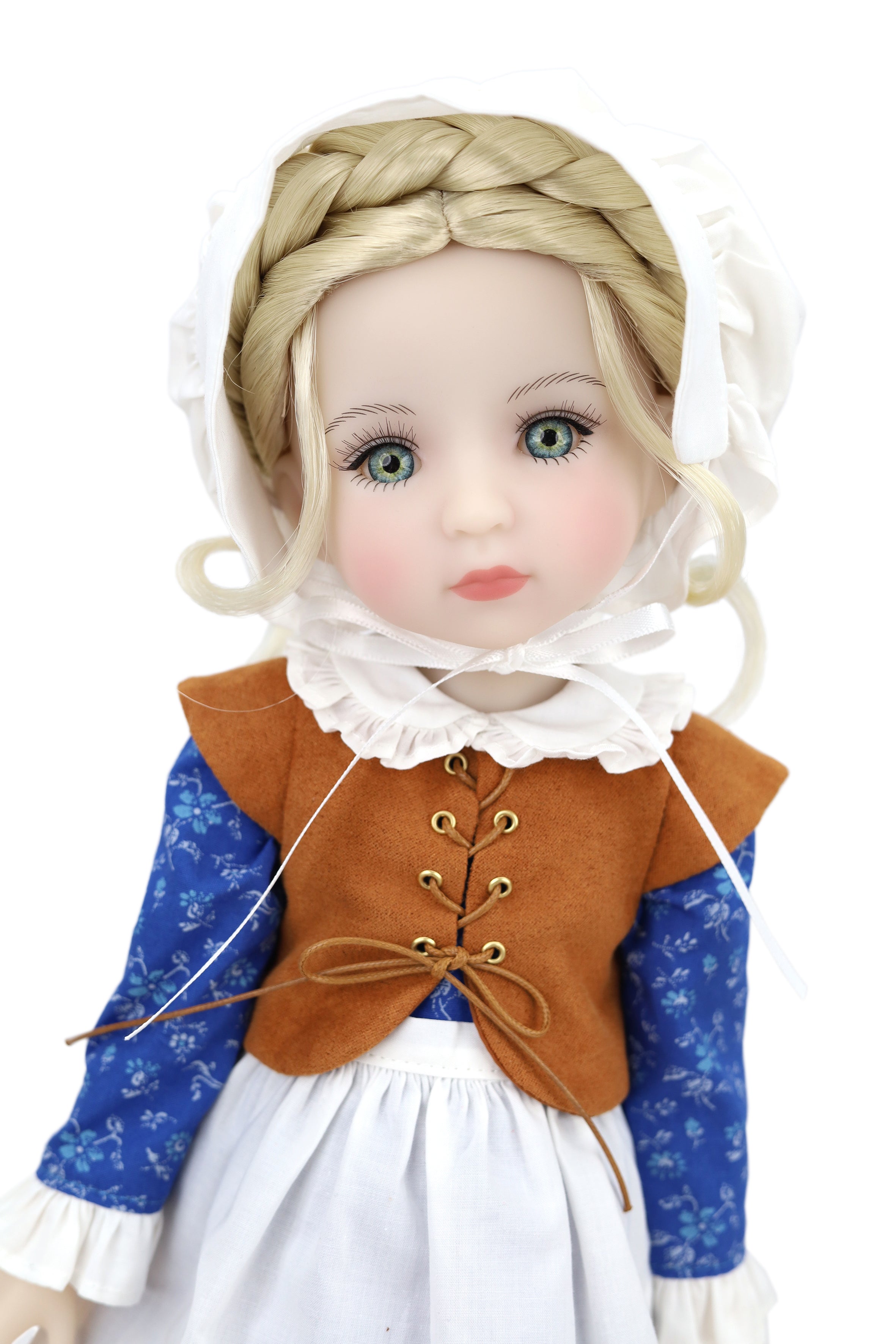 Doll in historical attire with a white background