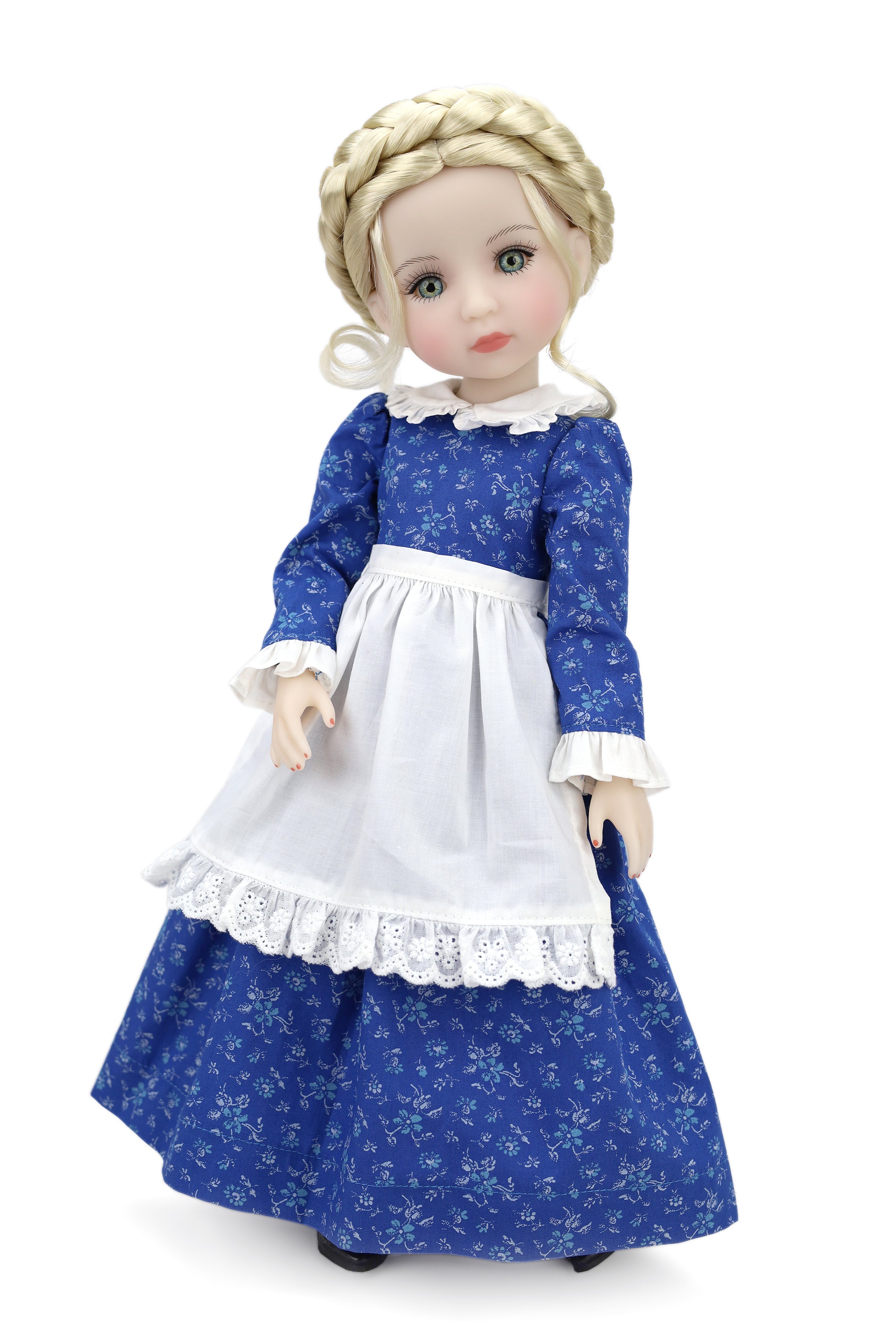 Doll wearing a blue dress with white floral pattern and apron on a white background