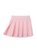 Pink pleated doll skirt on a white background