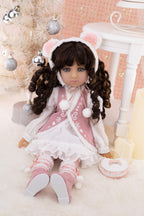 Doll in a festive setting with Christmas decorations