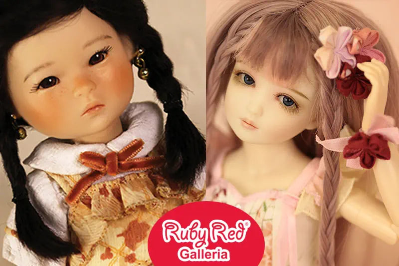 Close-up of a Ruby Red Galleria Ten Ping doll with dark hair and white clothing, featuring the brand 'Ruby Red Galleria'.