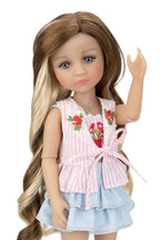 Doll wearing a pink and white striped dress with floral embroidery on a white background