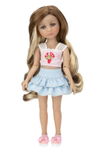 Doll with long blonde hair wearing a pink top with ice cream design and light blue skirt on a white background