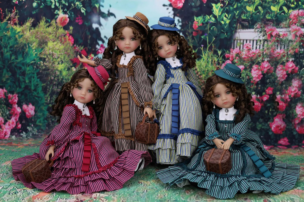 Four dolls in vintage attire sitting on a floral rug with a garden background