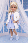 Doll wearing a white cardigan, blue dress, and white shoes with a blue background