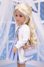Doll with blonde hair, white sweater, and blue polka dot dress holding a matching handbag.