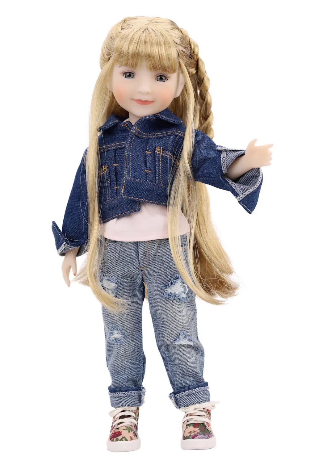 Doll wearing a denim outfit on a white background