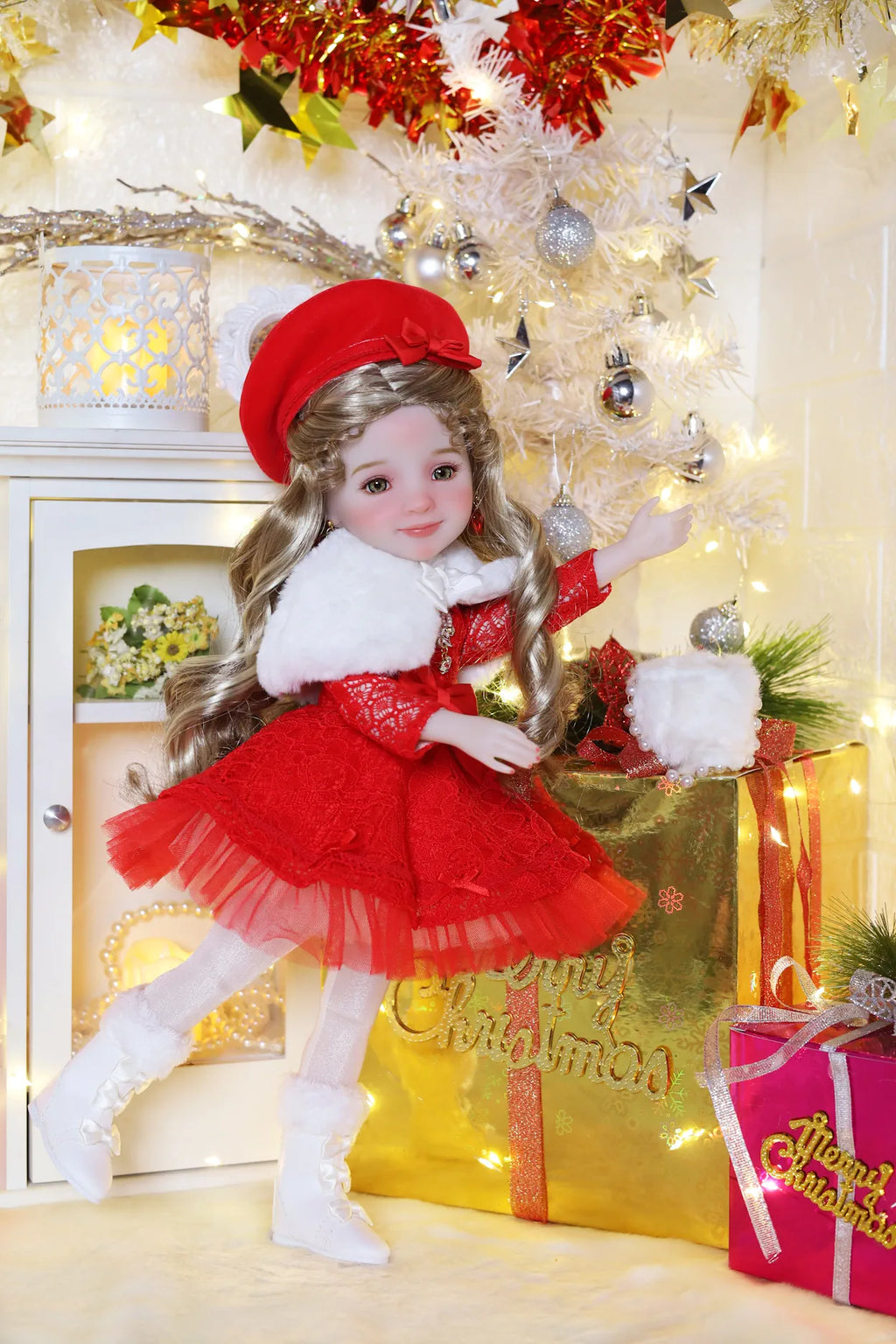 Christmas-themed doll in a festive setting with lights and presents.