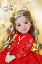 Doll in a red dress with a gold background