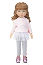 Doll wearing a pink shirt, white skirt, silver leggings, and pink shoes on a white background