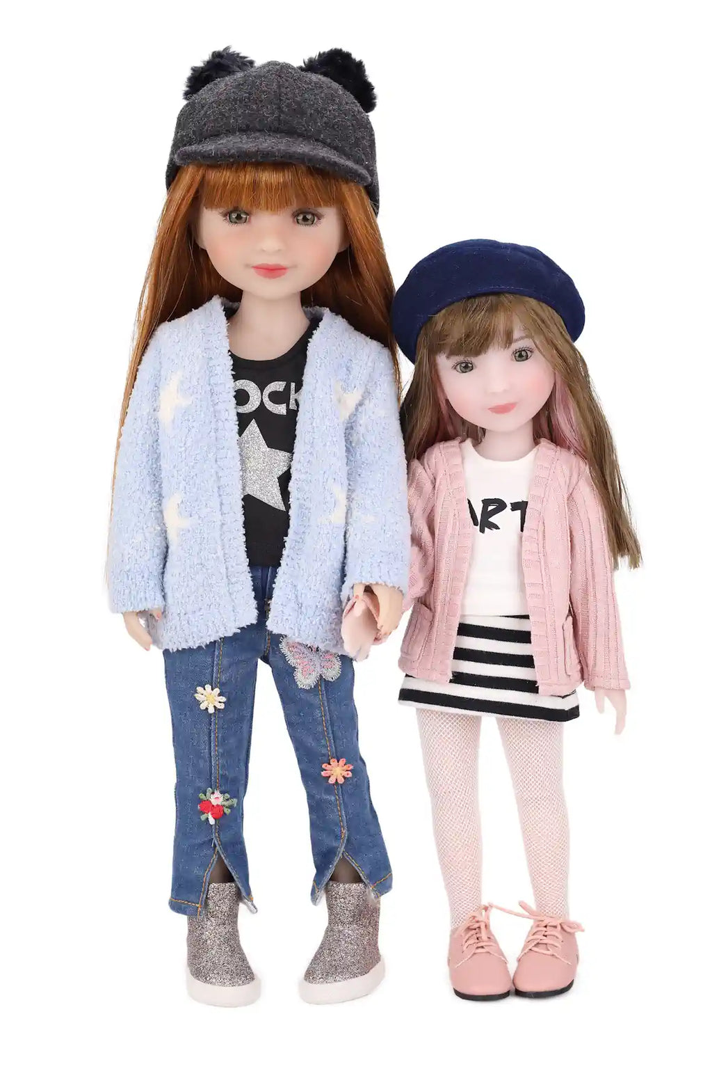 Stella and Sunny wearing stylish outfits with jackets and hats on a white background