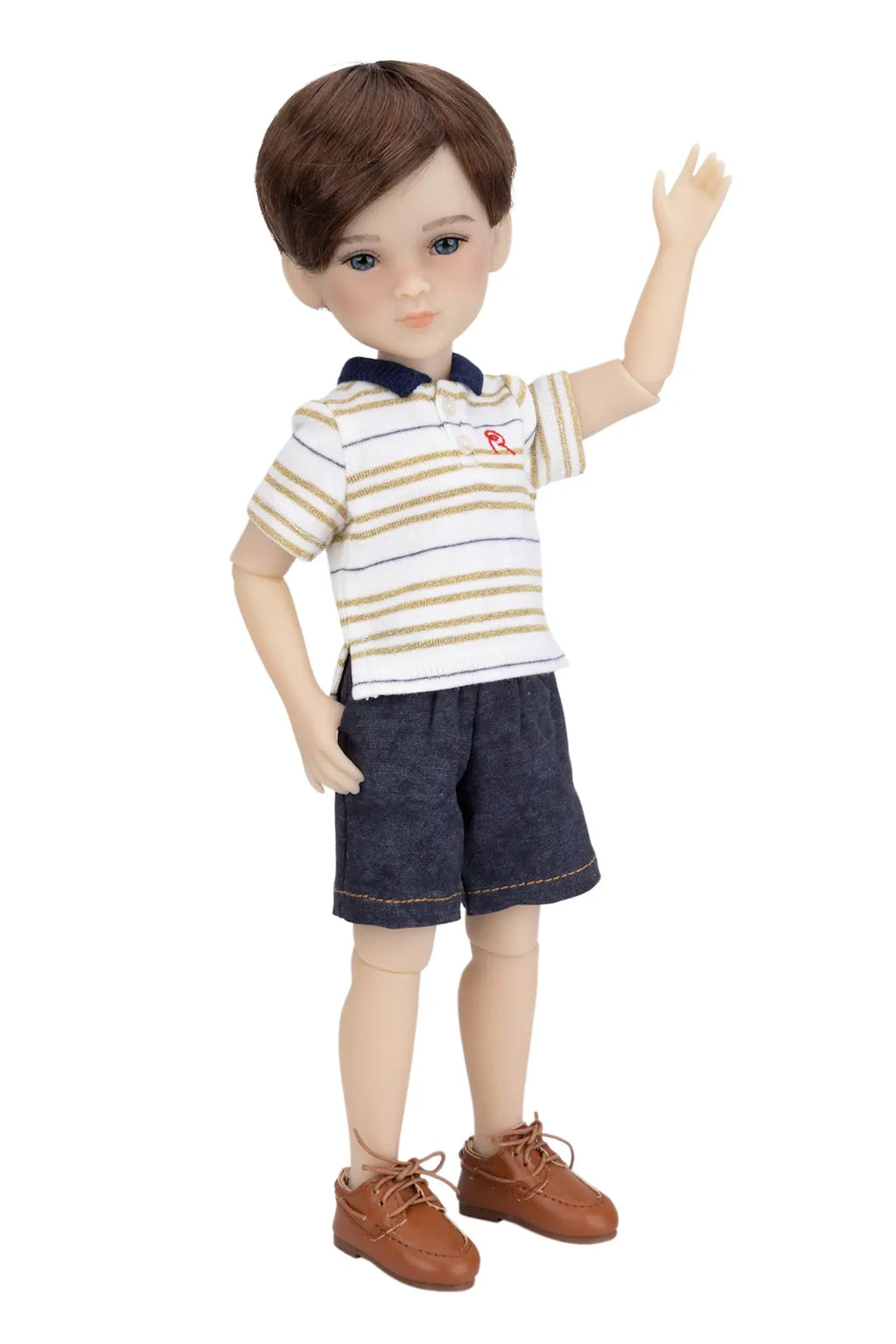 Doll wearing a striped shirt and shorts on a white background