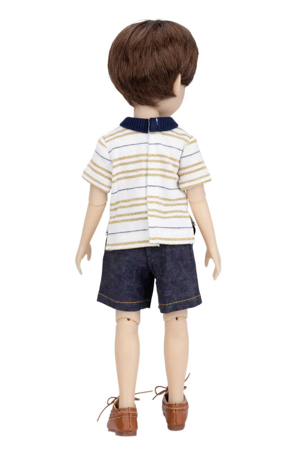 Doll wearing a striped shirt and shorts on a white background