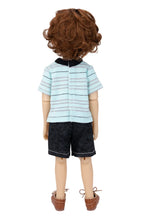 Doll wearing a striped shirt and shorts on a white background