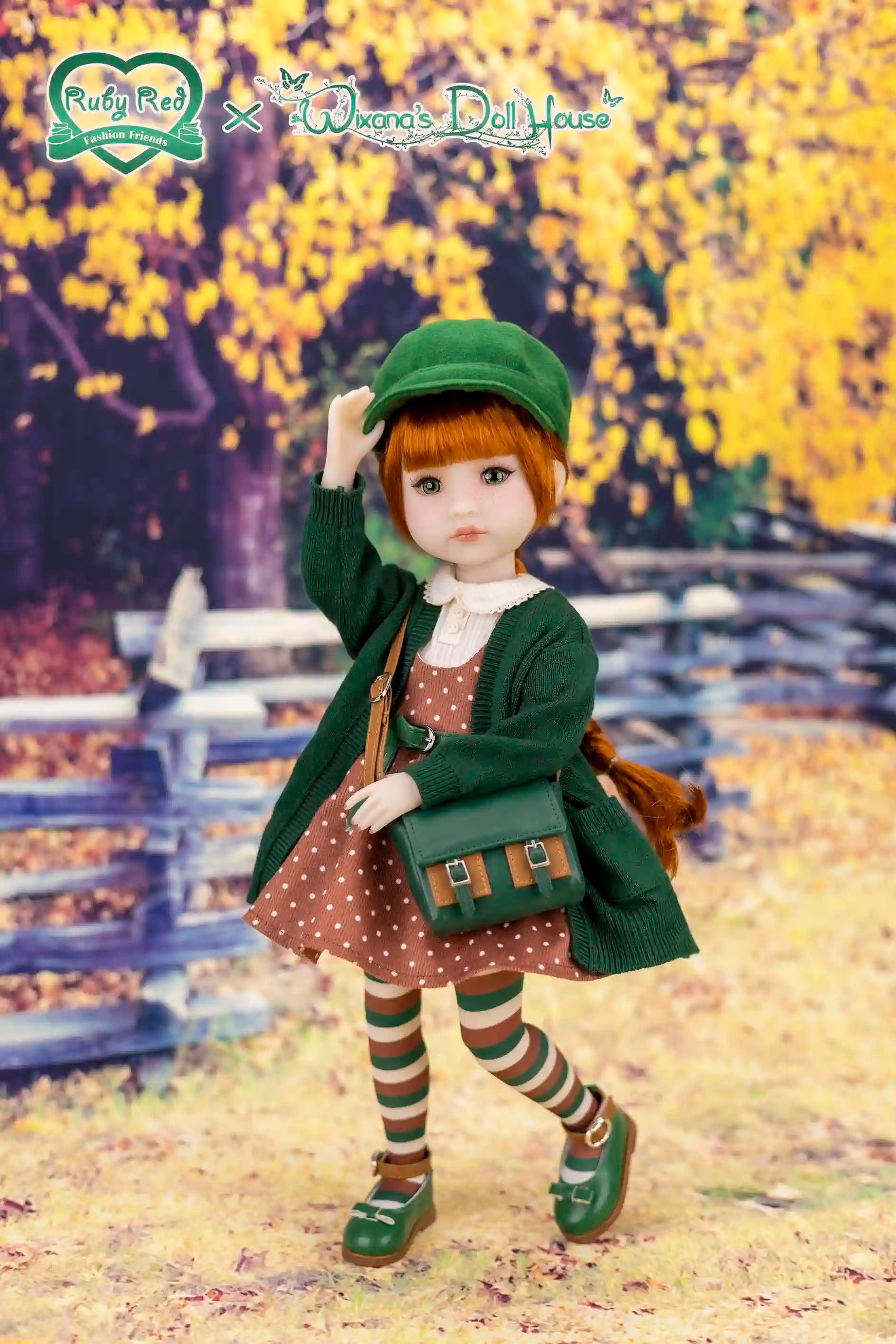 Doll in a green outfit with a polka dot dress, standing outdoors with autumn foliage.