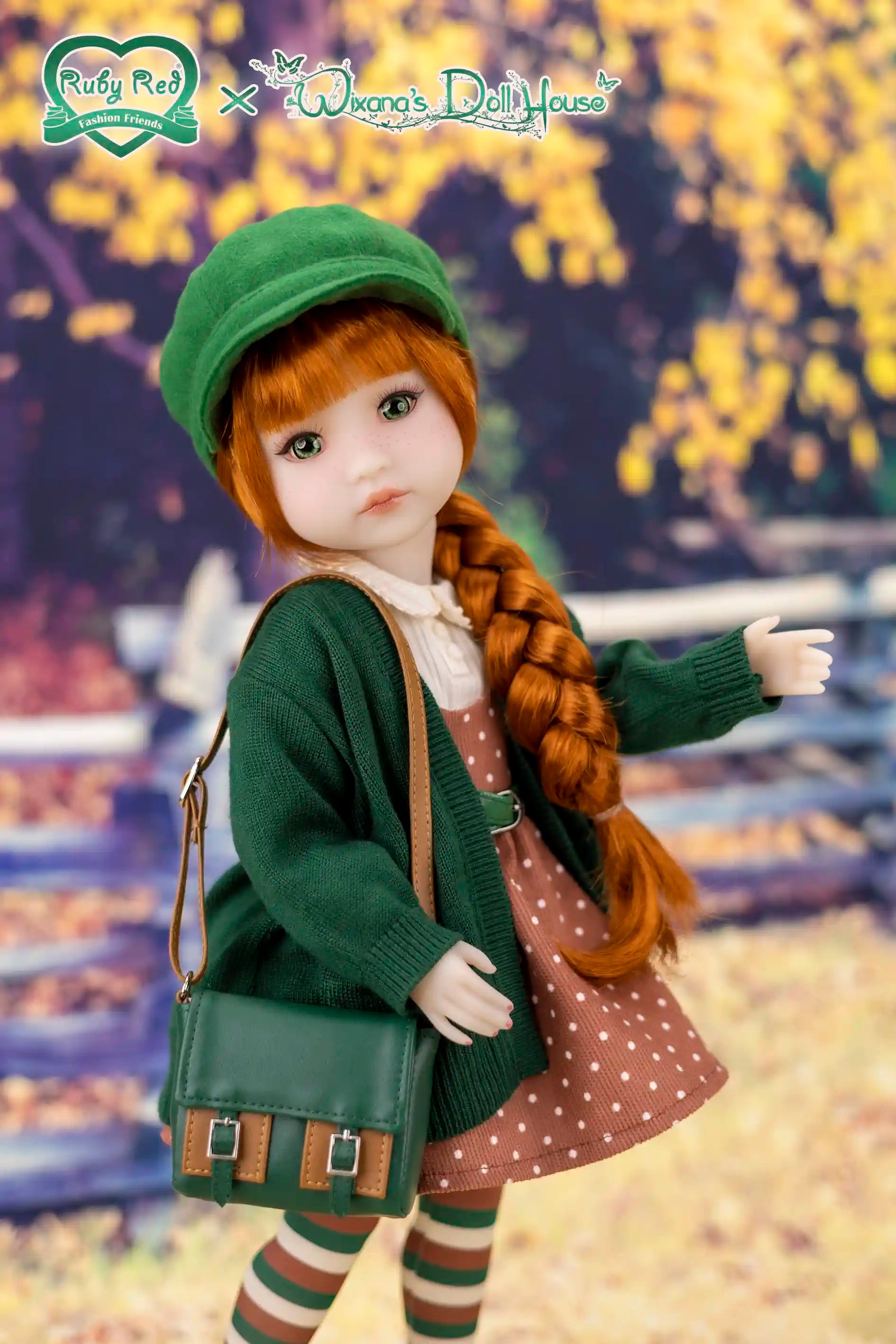 Doll with green outfit standing in front of a blurred autumn background