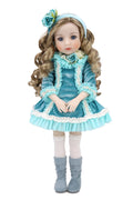 Doll in a blue dress with floral headband on a white background