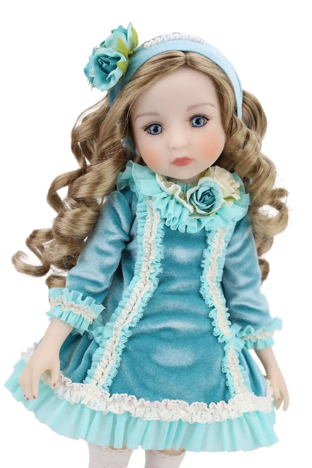 Doll in a blue dress with floral accents on a white background