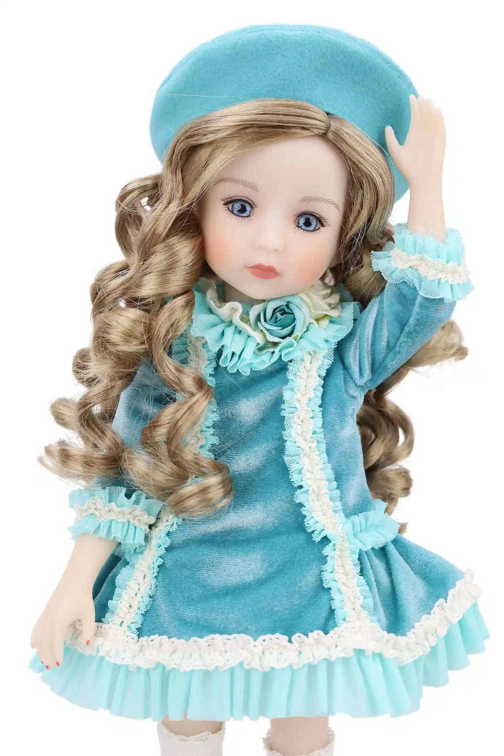Doll in a blue outfit with a matching beret on a white background