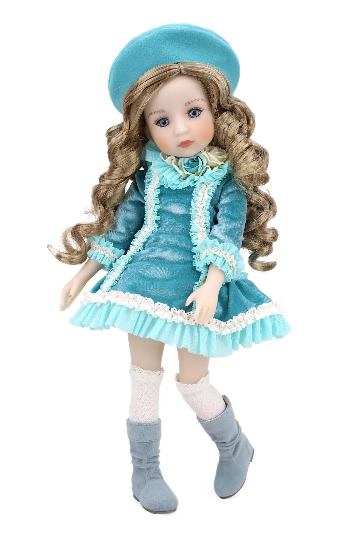 Doll in a blue outfit with a matching hat on a white background