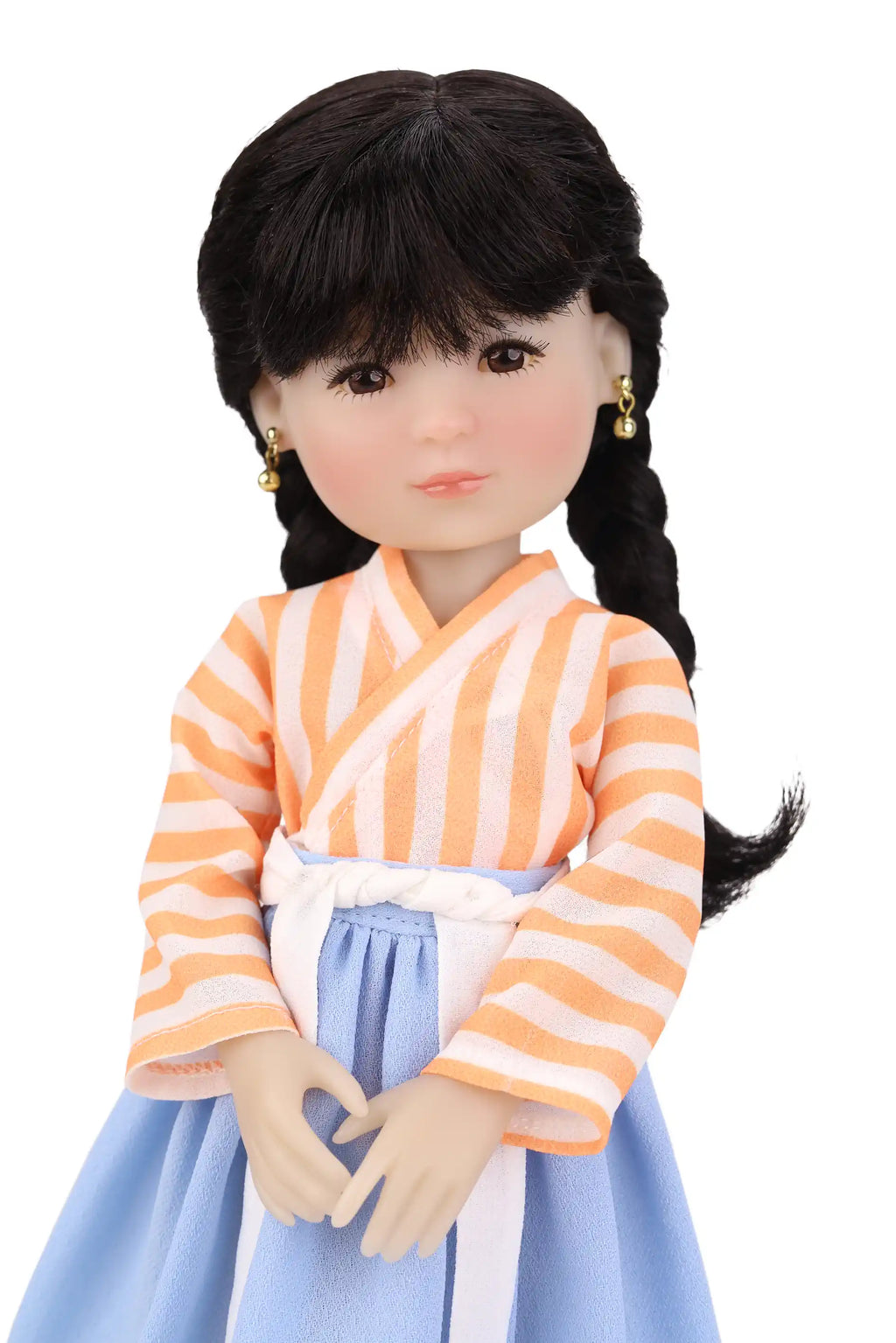 Doll wearing a traditional outfit with an orange and white striped top with a blue skirt on a white background