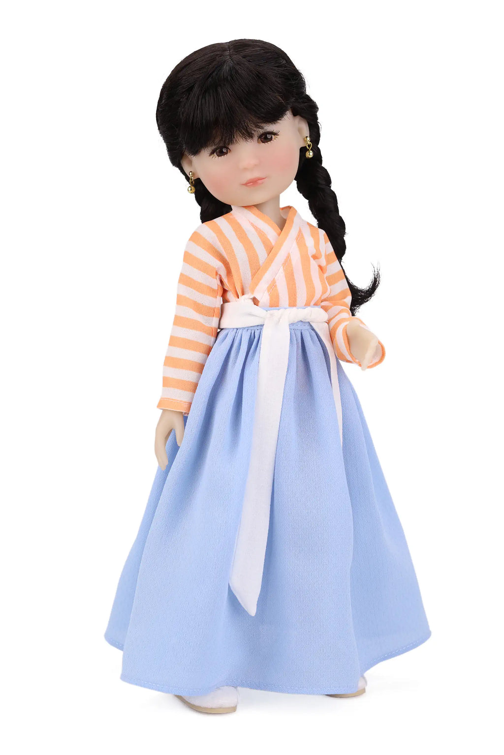 Doll wearing a traditional outfit with an orange and white striped top with a blue skirt on a white background