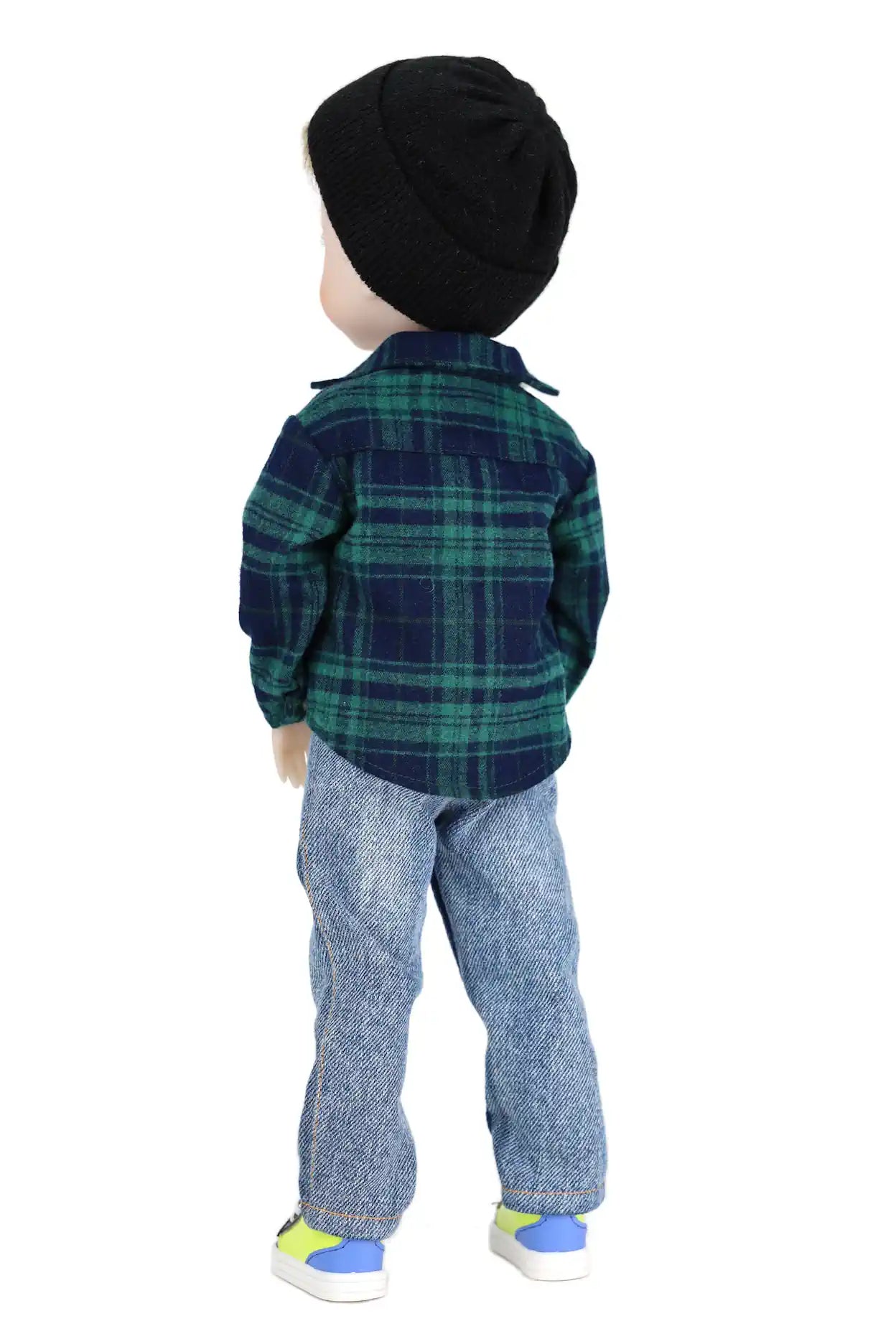 Alex wearing a plaid shirt and jeans with a black hat on a white background