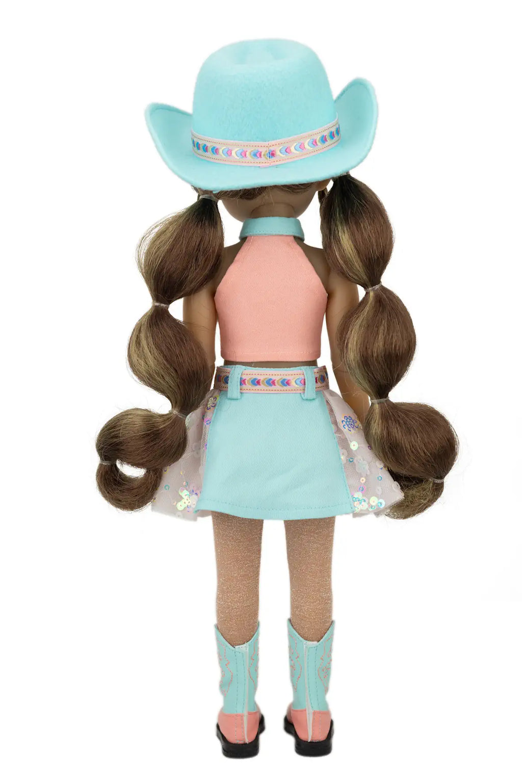 Amina with long brown hair styled in pigtails, wearing a turquoise cowboy hat, pink top, light blue skirt, and turquoise boots on a white background.