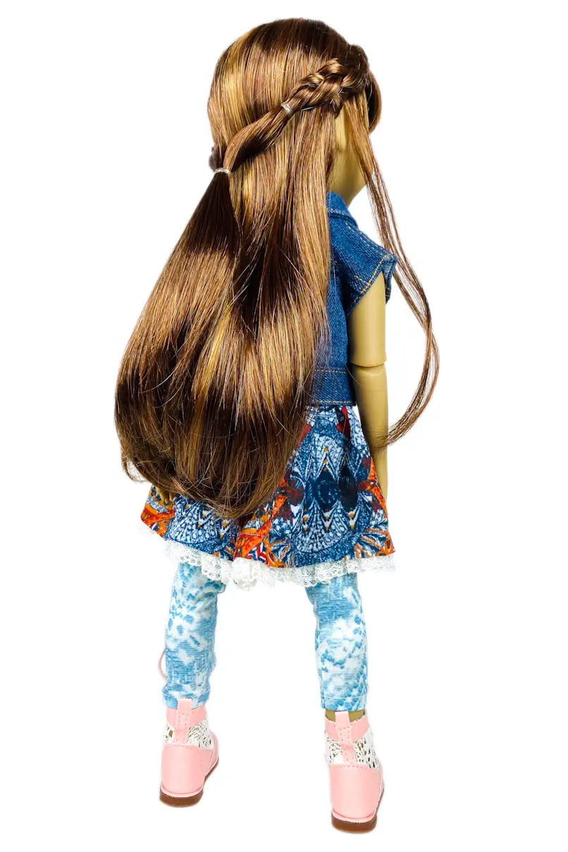 Bella with long braided hair wearing a colorful outfit on a white background