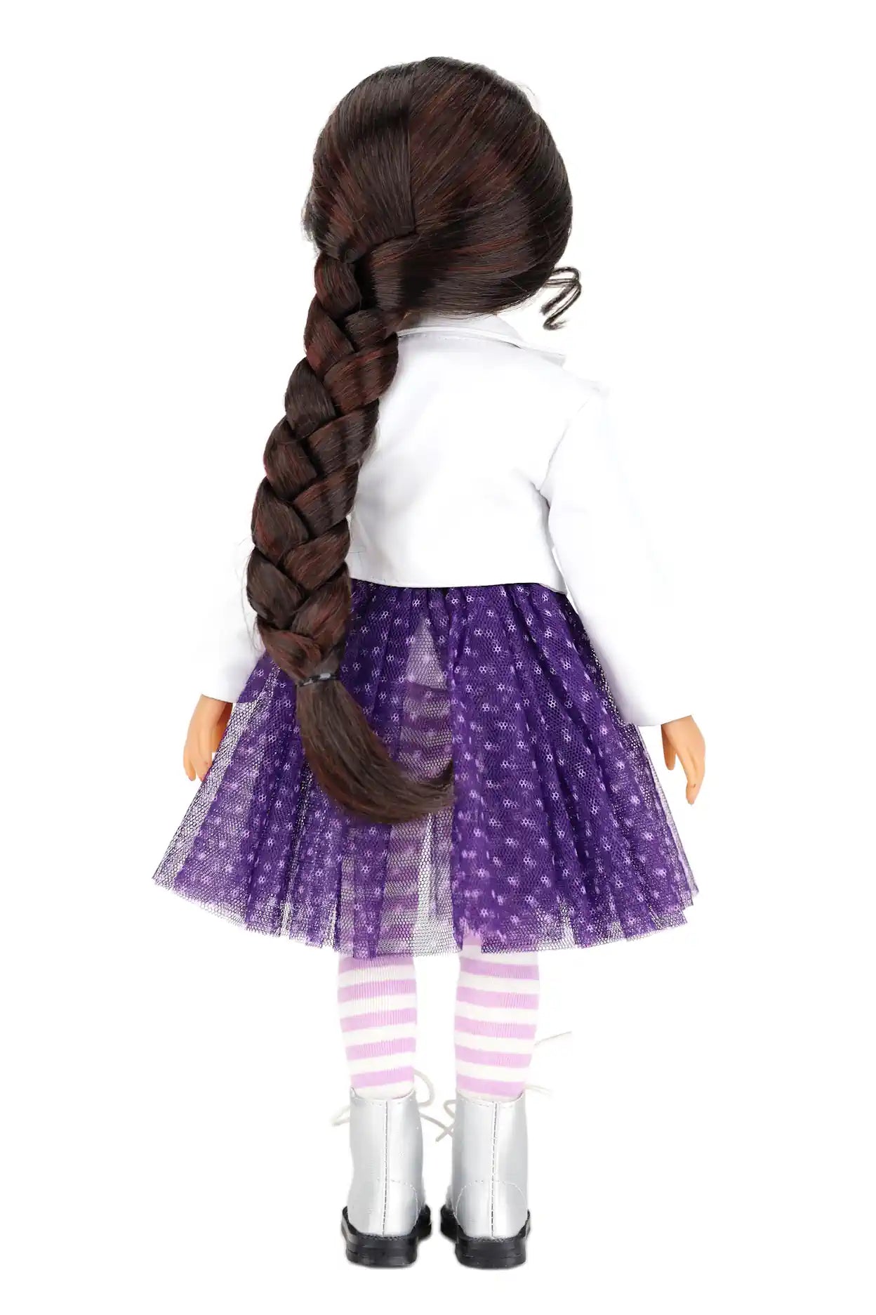 Freida with long braided hair wearing a white shirt, purple skirt with white polka dots, and striped leggings on a white background.