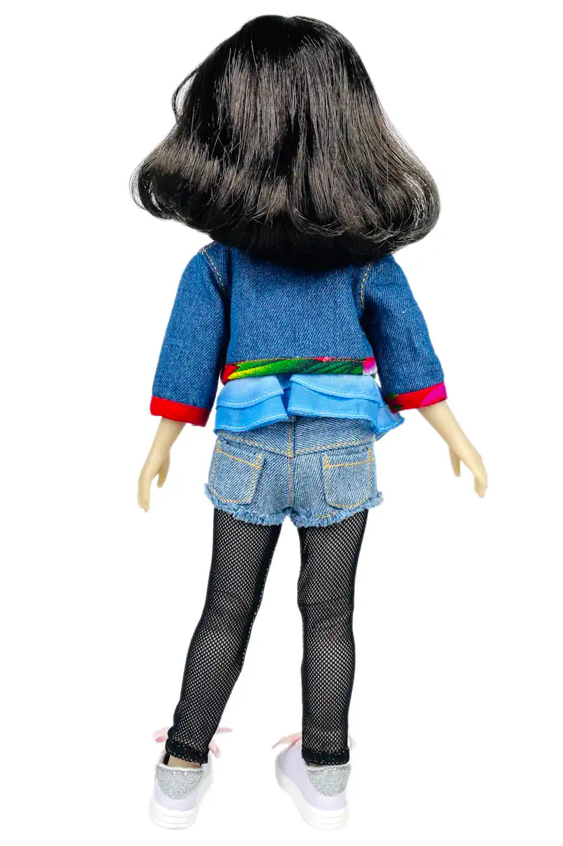 Hanna wearing a denim outfit with a colorful belt on a white background