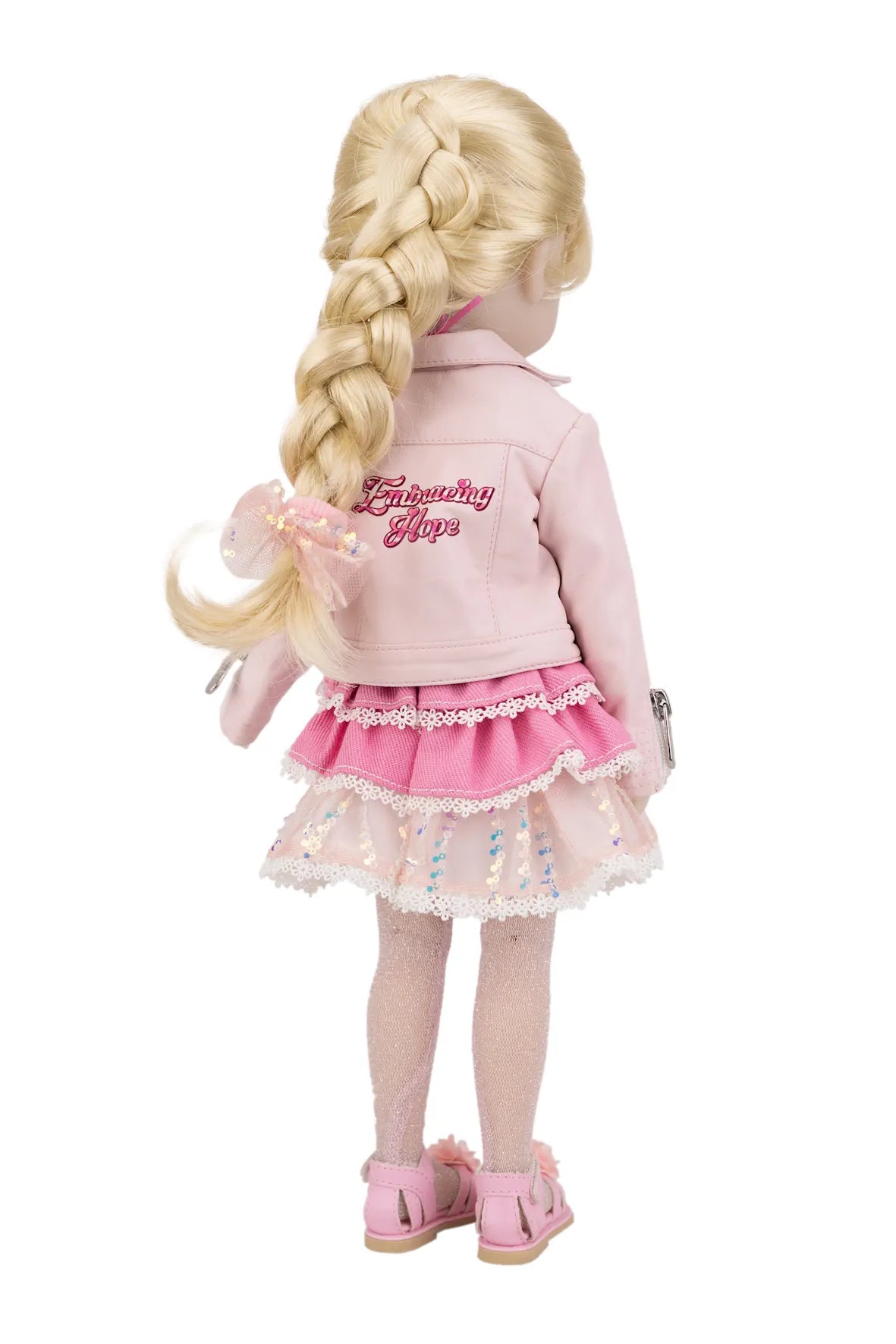 Karina wearing a pink outfit on a white background
