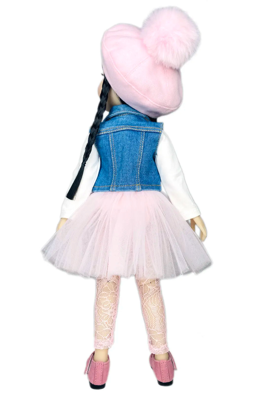 Lila with black hair, denim vest, and pink skirt on a white background