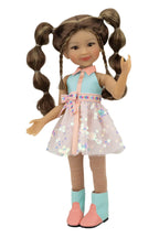 Abby with pigtails wearing a light blue dress and pink shoes on a white background