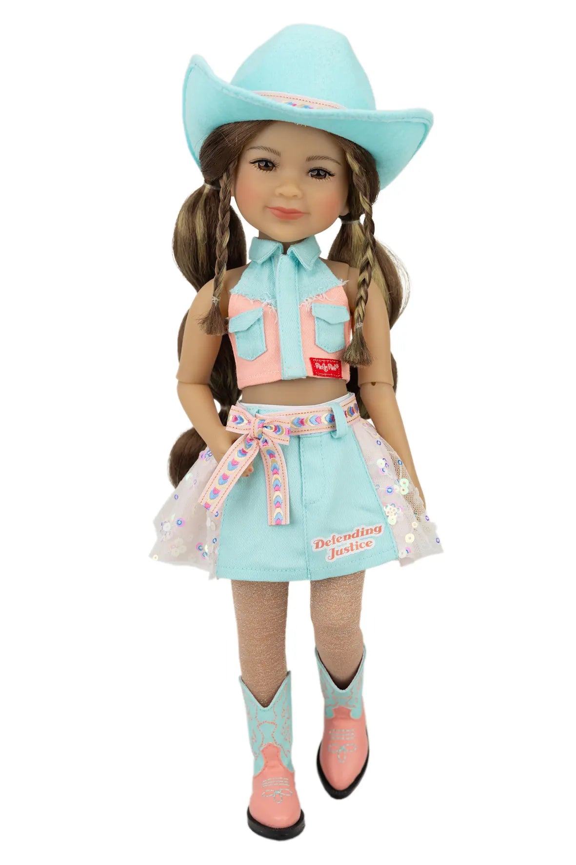 Amina in a cowgirl outfit with a turquoise hat and boots on a white background