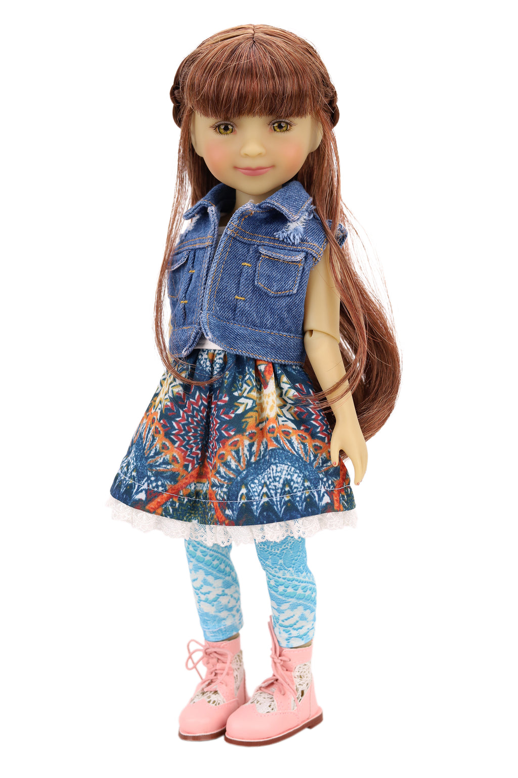 Bella wearing a denim jacket, colorful skirt, and pink shoes on a white background