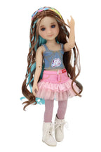 Ella with long hair styled in braids, wearing a blue top and pink skirt on a white background