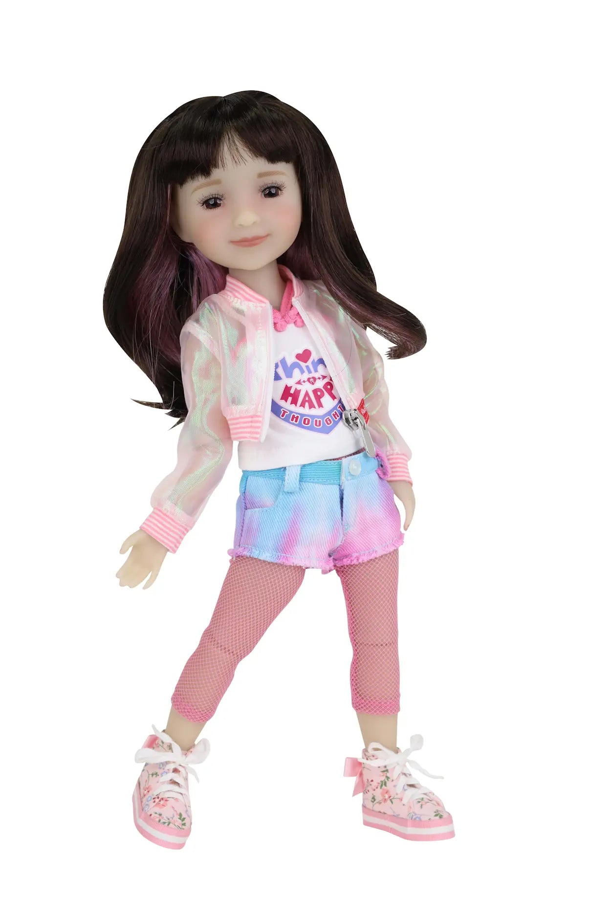 Hanna stands with one leg bent in a sheer jacket, white tank, tie-dye shorts, fishnet tights, and floral sneakers.
