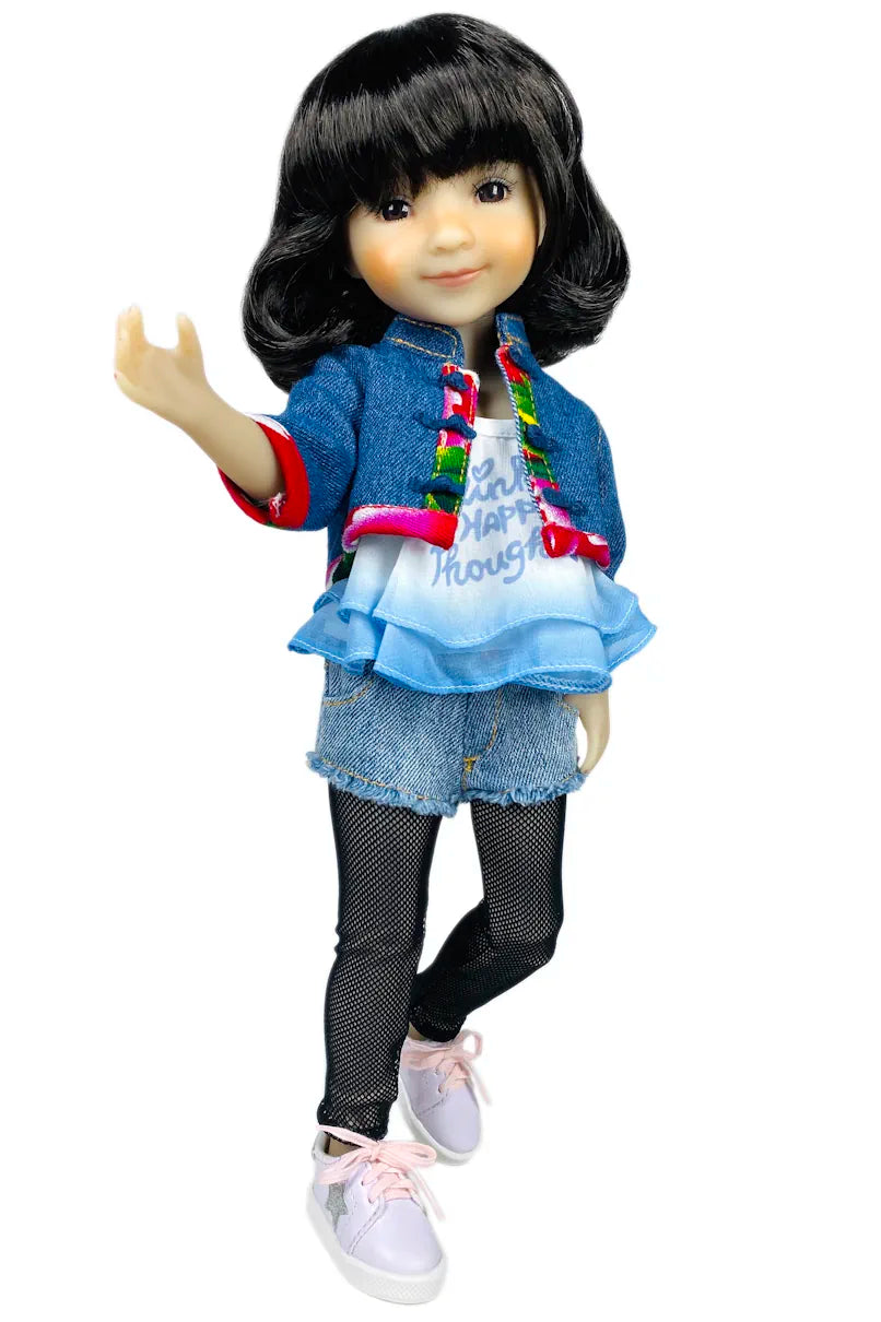 Hanna with black hair wearing a blue denim jacket and shorts on a white background