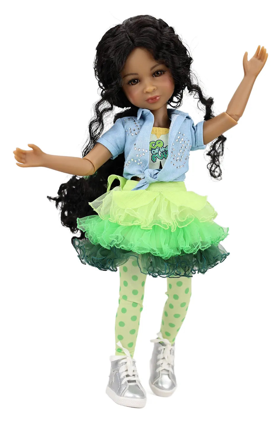 Jada with green and black outfit on a white background