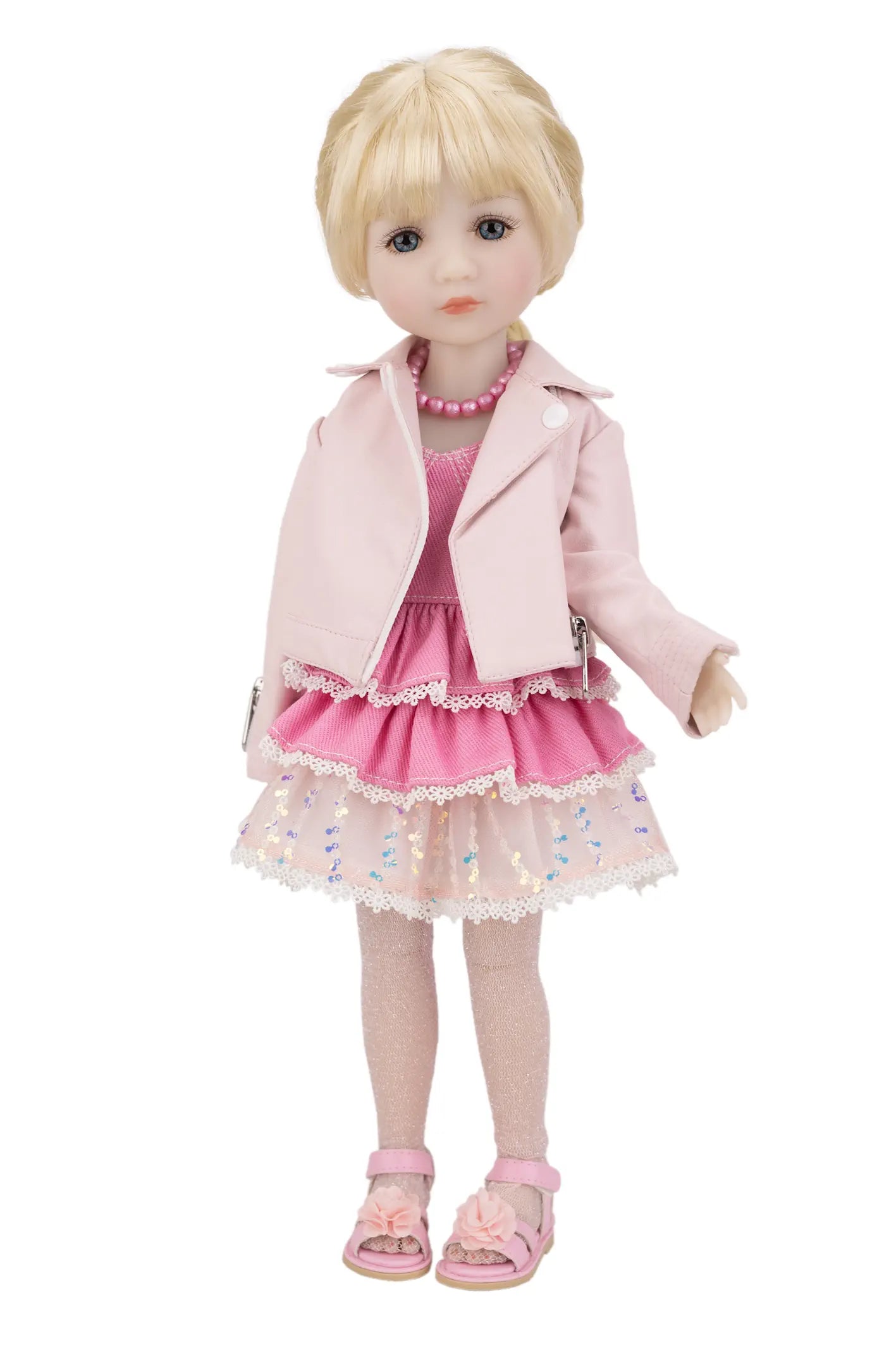 Karina wearing a pink dress and jacket on a white background