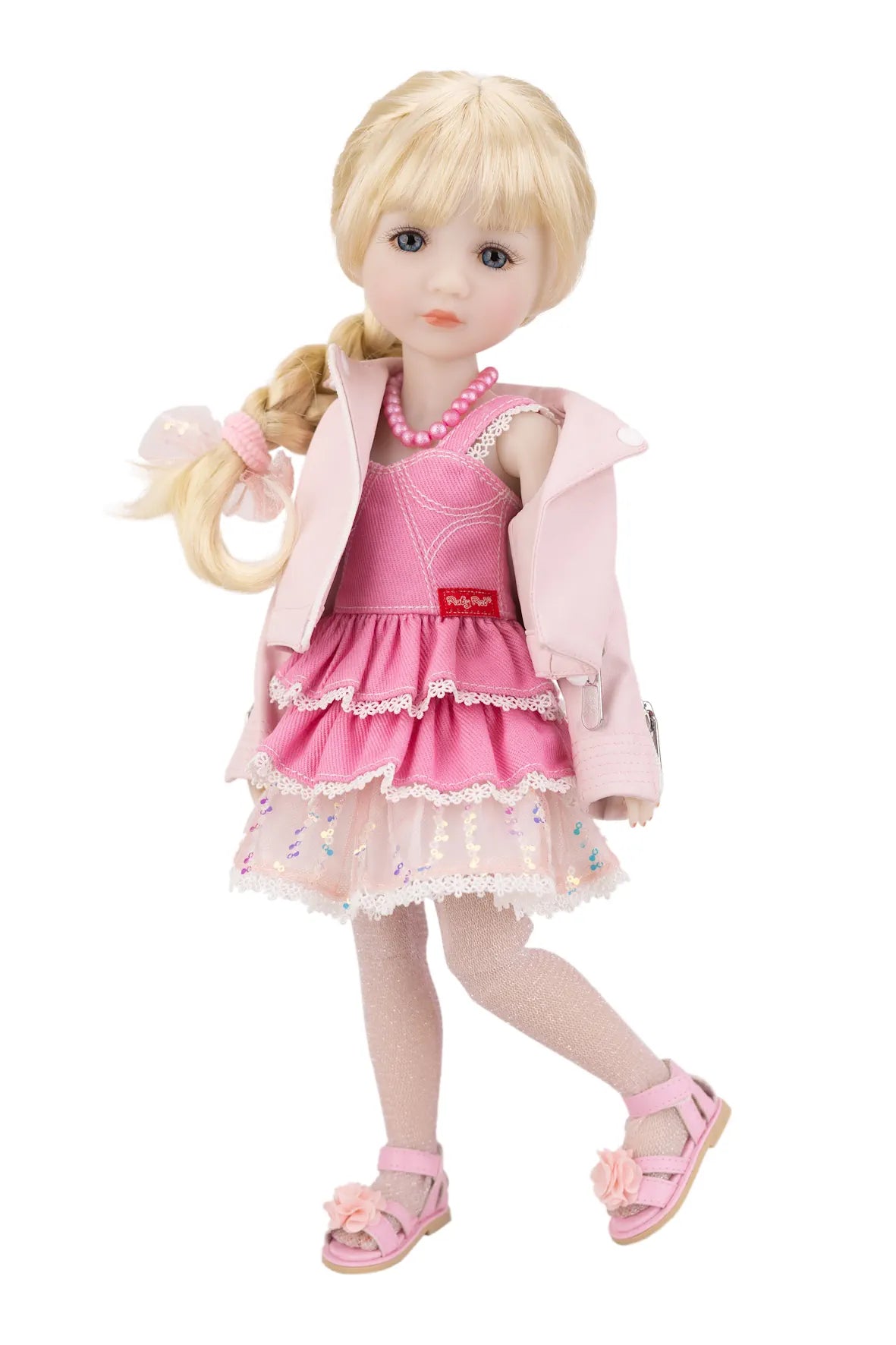 Karina in a pink dress with a matching jacket on a white background