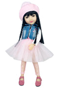 Lila with long dark hair, pink hat, denim jacket, and pink skirt on a white background