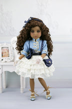 Ruth in a blue outfit with a white background