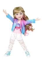 Sara, blonde hair with pink highlights, in tie-dye jacket, pink T-shirt, lace pants, arms raised, white background.