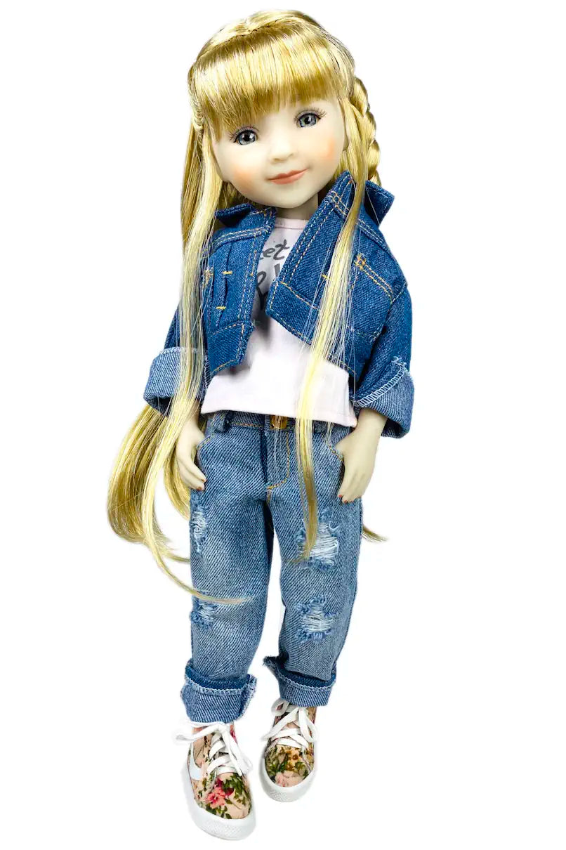 Sara wearing a denim outfit with a white background