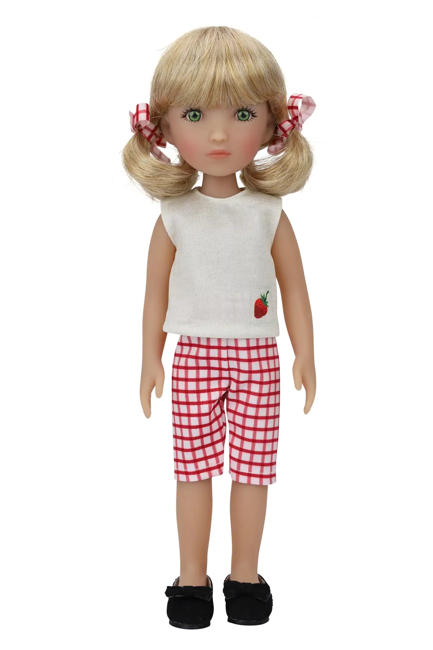 Summer, a doll with blonde pigtails and checkered bows, stands in a white top, checkered capri pants, and black shoes.
