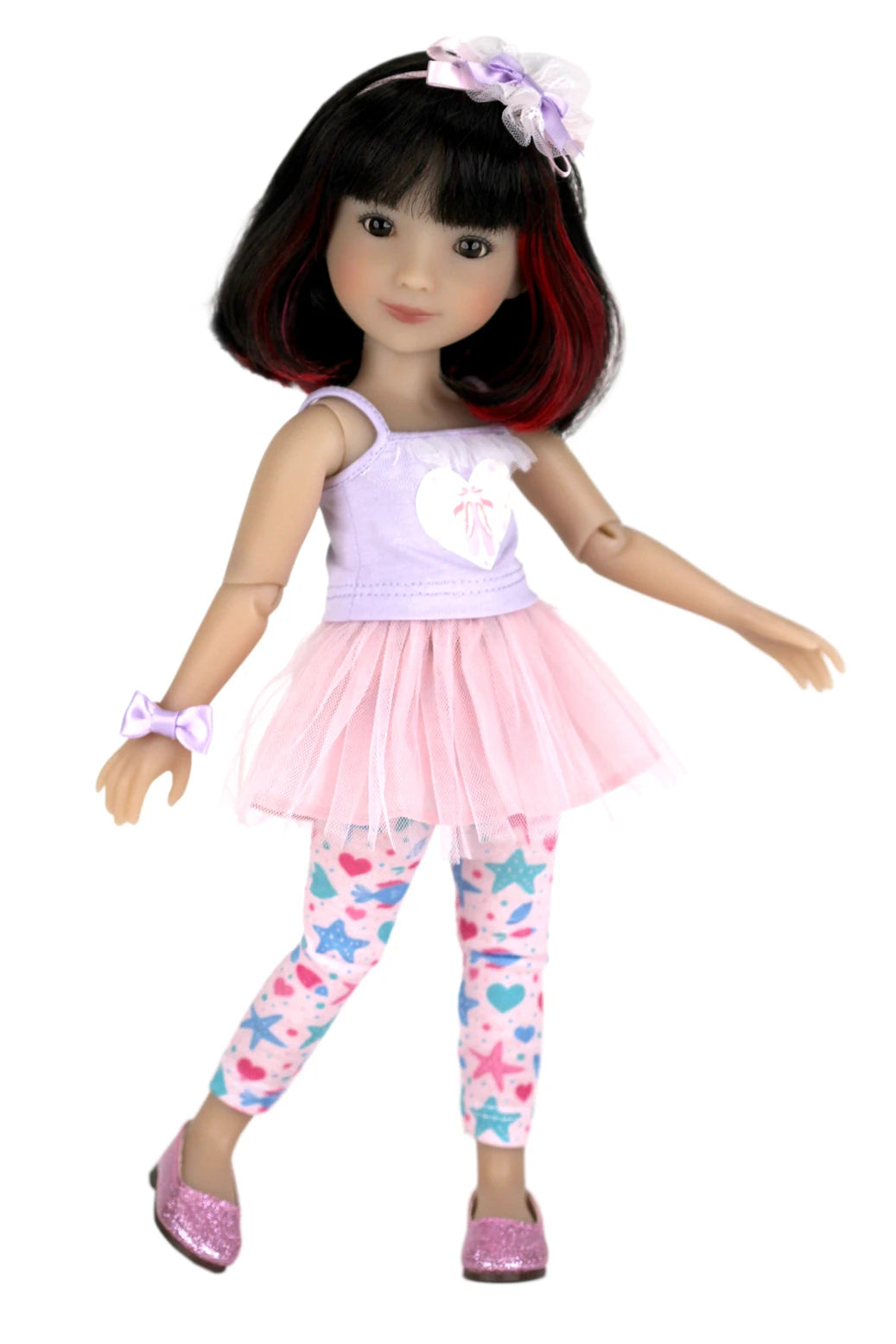 Sydney with pink outfit and headband on a white background