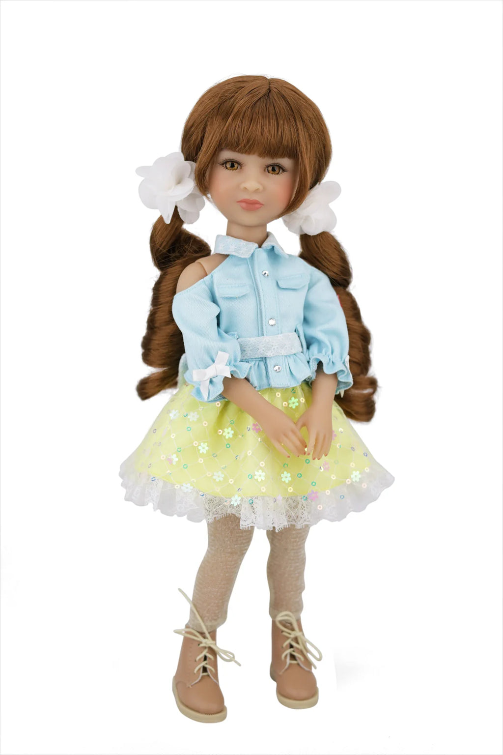 Valeria with brown hair styled in pigtails, wearing a light blue jacket, yellow dress with white flowers, and beige boots on a white background.