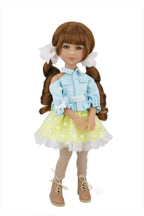 Valeria with brown hair styled in pigtails, wearing a light blue jacket, yellow dress with white flowers, and beige boots on a white background.